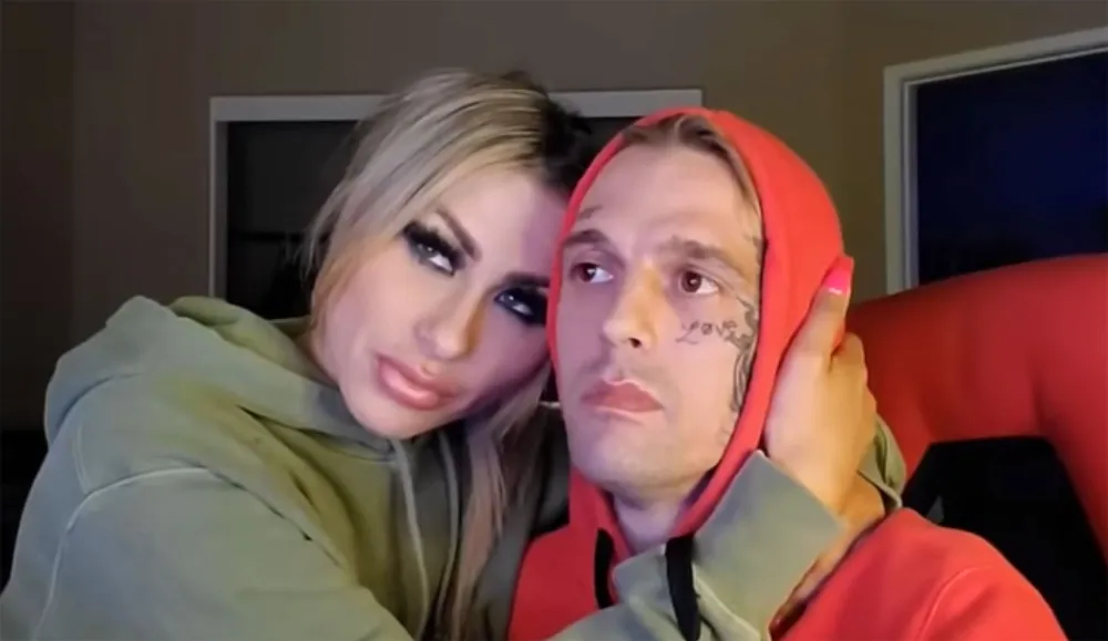 Aaron Carter Reveals On-Off Girlfriend Melanie Martin Suffered a Miscarriage Red Hoodie