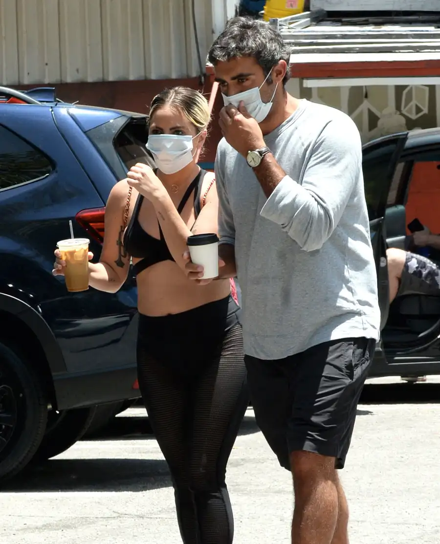 Lady Gaga and Michael Polansky Mask Holding Hands Hug