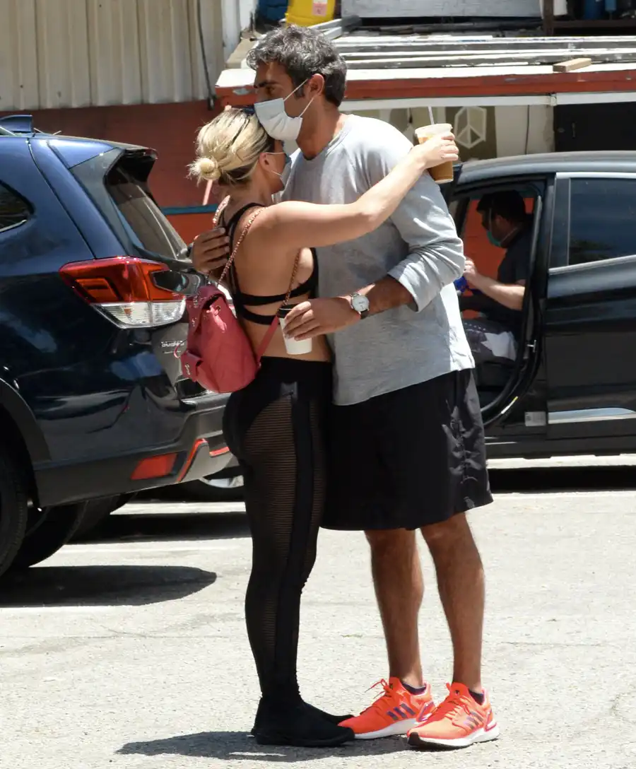 Lady Gaga and Michael Polansky Mask Holding Hands Hug
