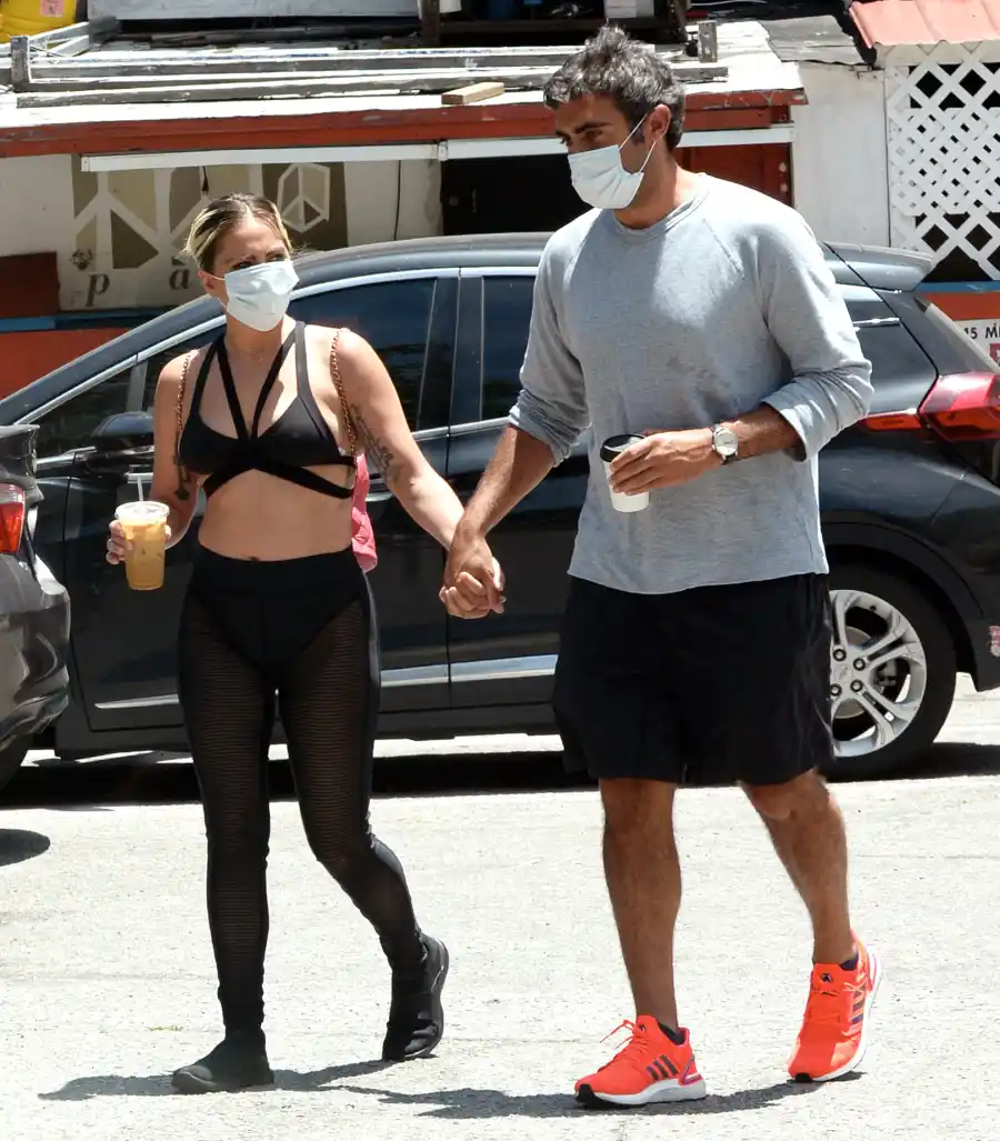 Lady Gaga and Michael Polansky Mask Holding Hands Hug