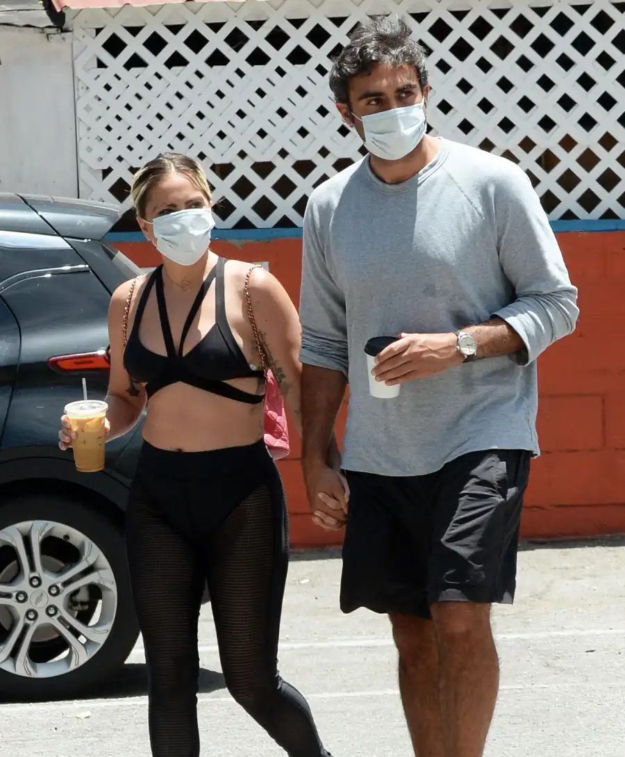 Lady Gaga and Michael Polansky Mask Holding Hands Hug