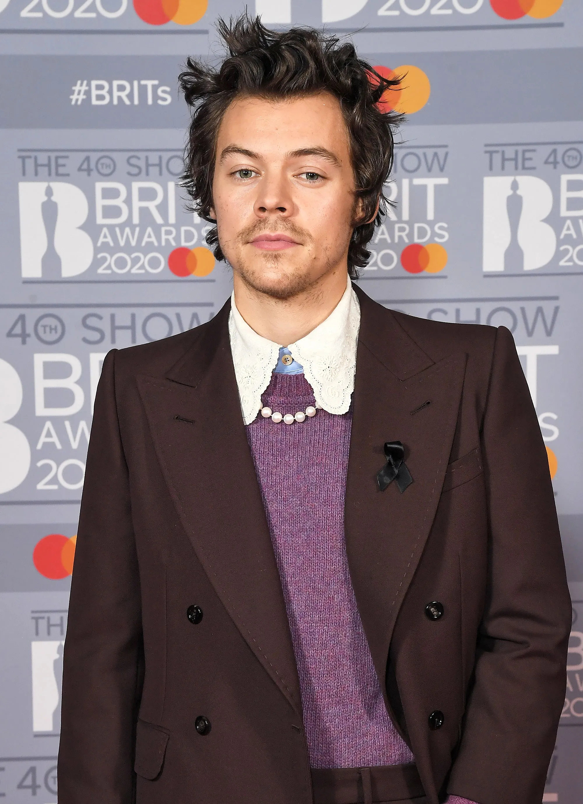 Harry Styles Debuts ‘Mario Mustache’ 9 Years Later