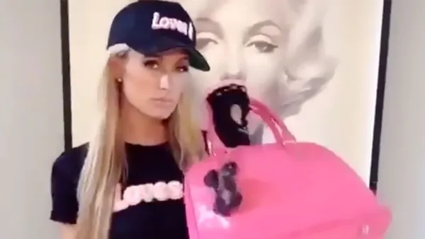 Watch Paris Hilton Work Out With Louis Vuitton Bags