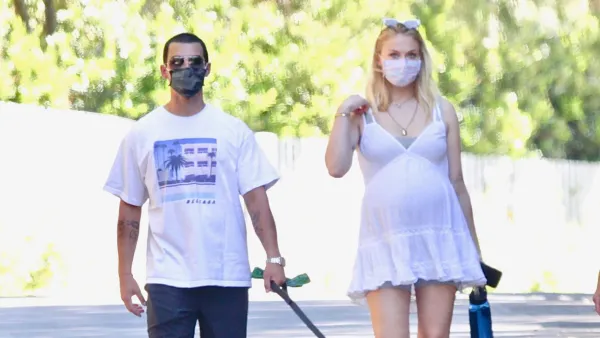 Pregnant Sophie Turner Cradles Her Baby Bump on a Walk With Joe Jonas