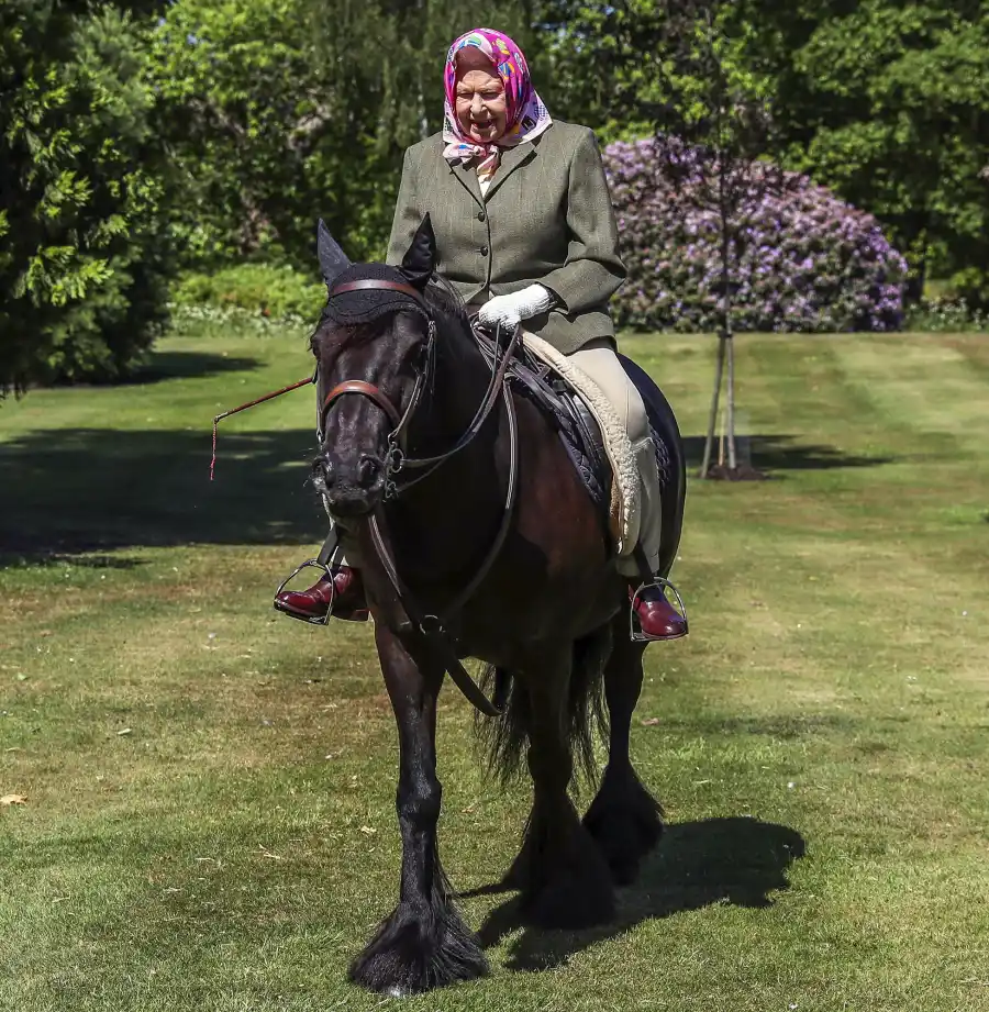 Queen Elizabeth II riding a horse