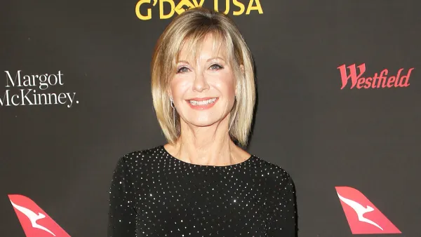 Olivia Newton-John attends the 2018 G8Day USA Black Tie Gala REELZ Profiles Olivia Newton-John Health Crisis in Tell-All Special