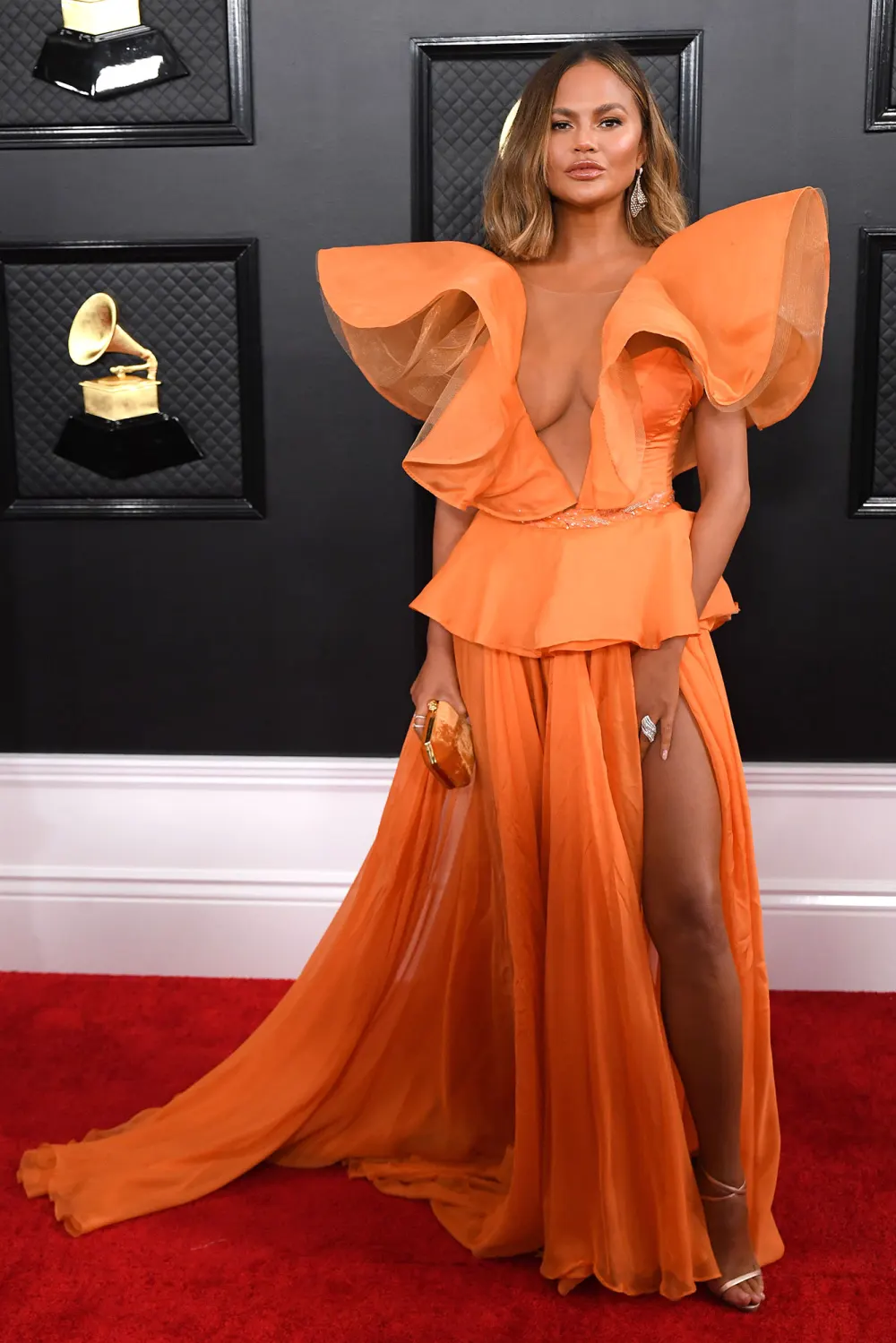 Chrissy Teigen Claps Back After a Twitter Troll Calls Her Cookware Line Junk