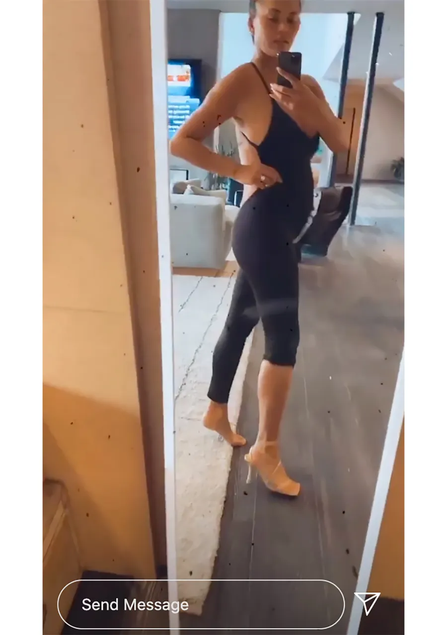 Chrissy Teigen Shows Off Her Growing Bump in a Seriously Cool Bodysuit