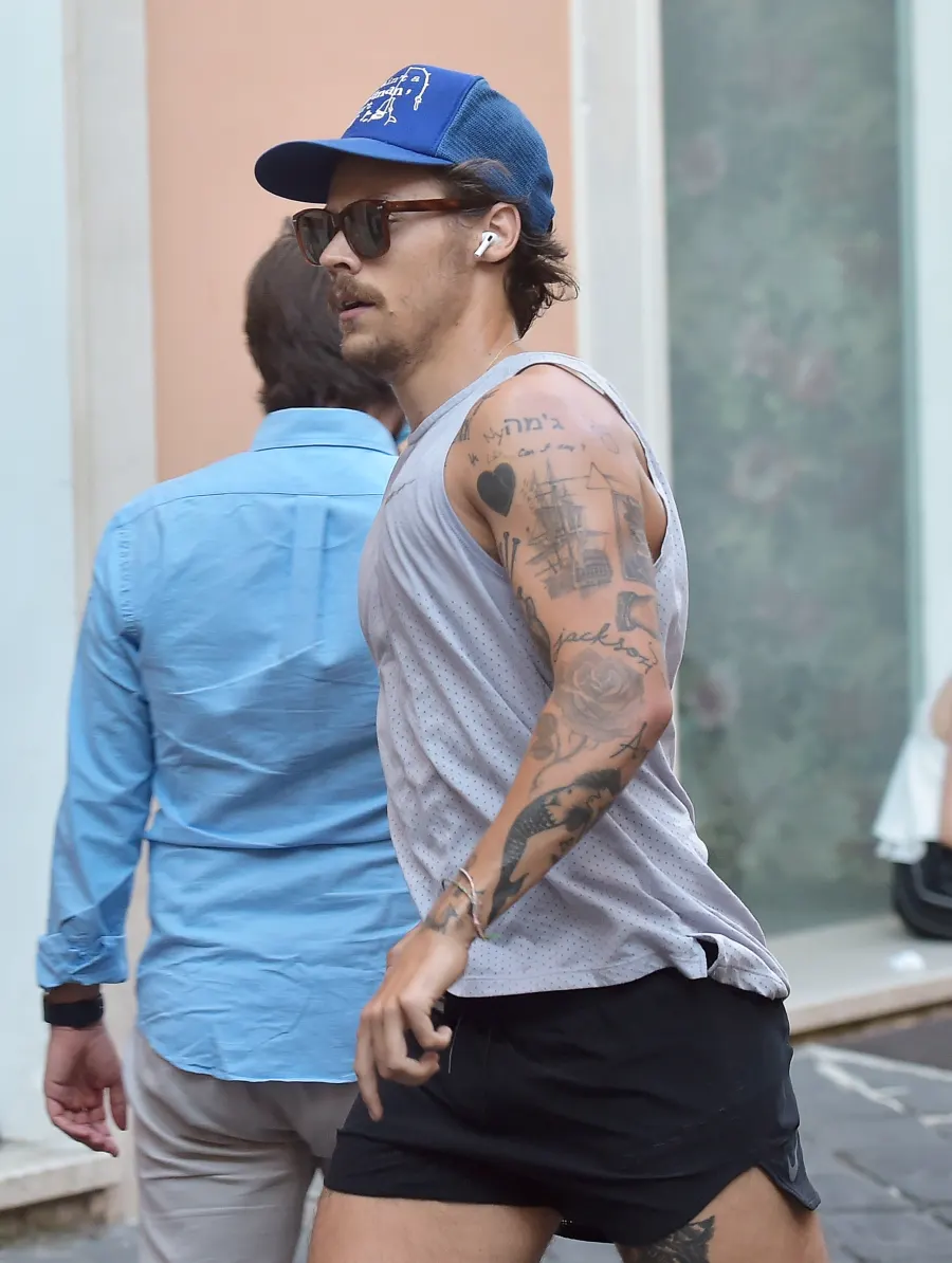 Harry Styles Sports 70s-Inspired Quarantine Mustache While Jogging In Rome