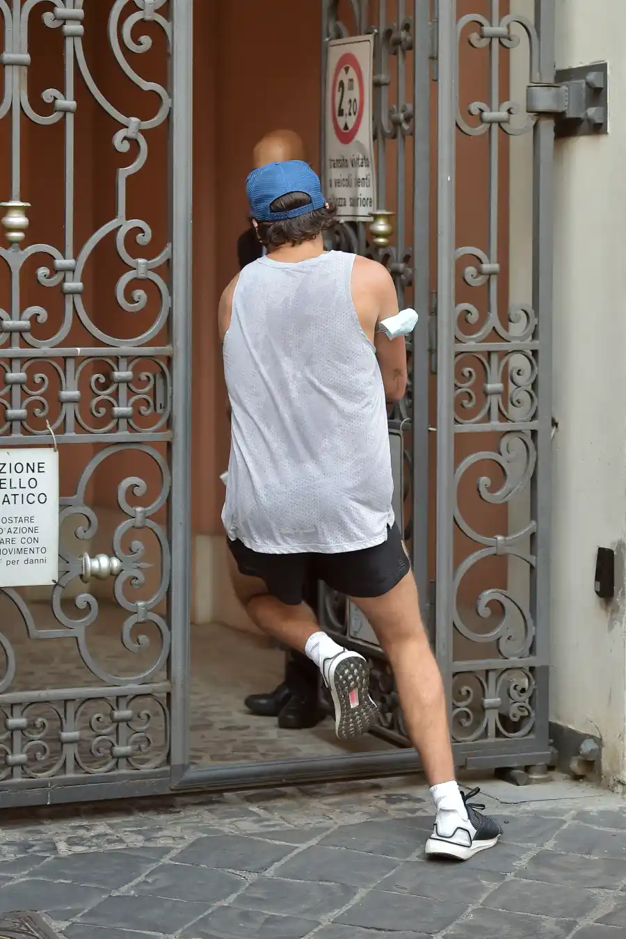 Harry Styles Sports 70s-Inspired Quarantine Mustache While Jogging In Rome