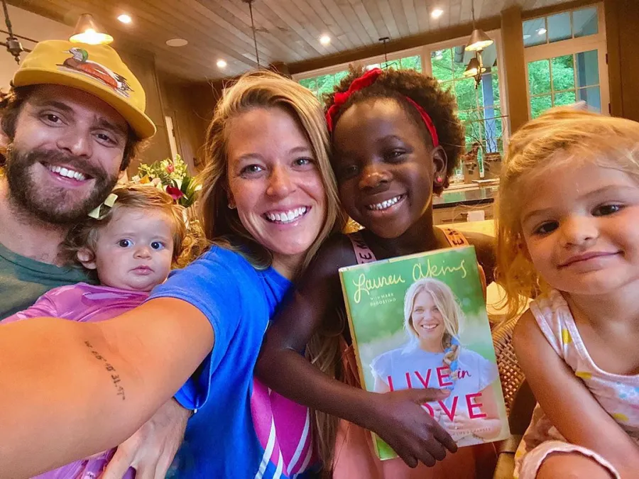 Lauren Akins with Thomas Rhett daughters book release