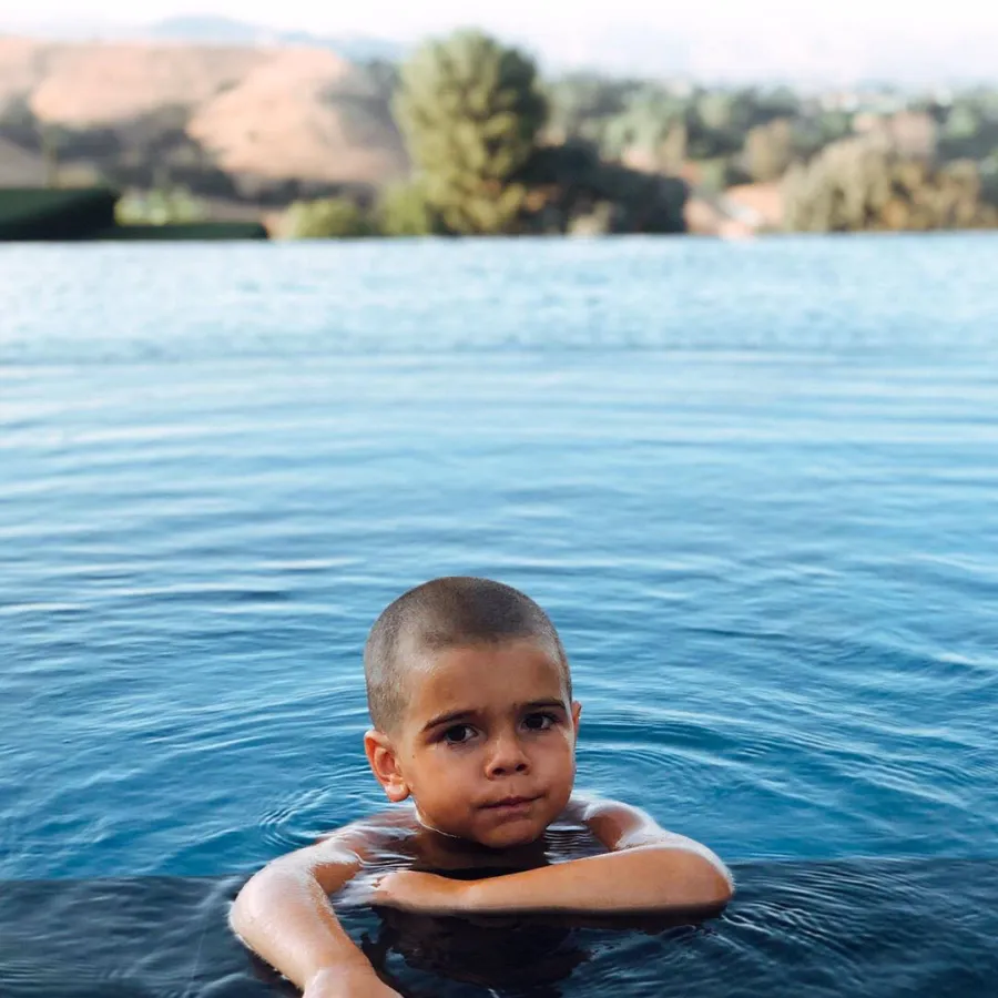 Scott Disick Shares New Photo Reign Shaved Head Play on Playa