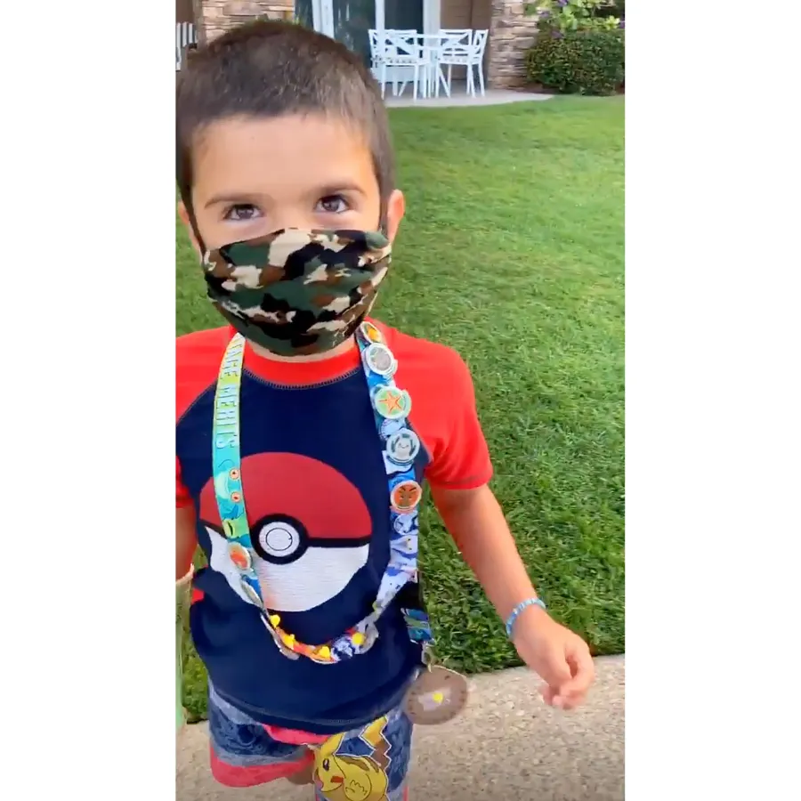 Teddi Mellencamp Son Cruz Wearing camouflage Face Mask