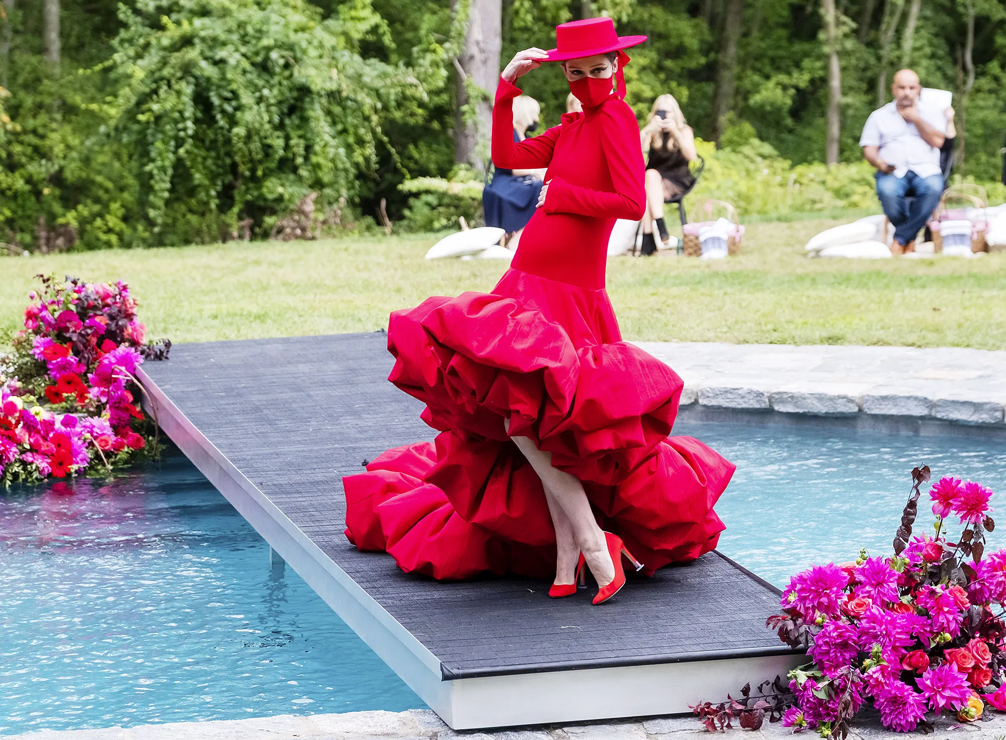 Pregnant Coco Rocha Turns Heads on the Christian Siriano NYFW Runway Showing Off Her Baby Bump in a Red Gown