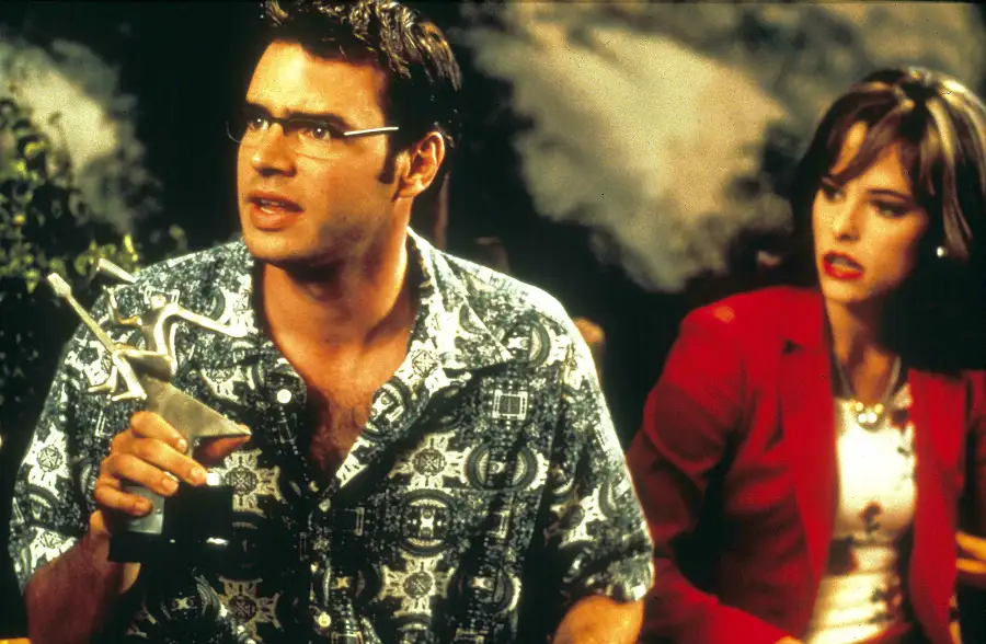 Scott Foley and Parker Posey scream