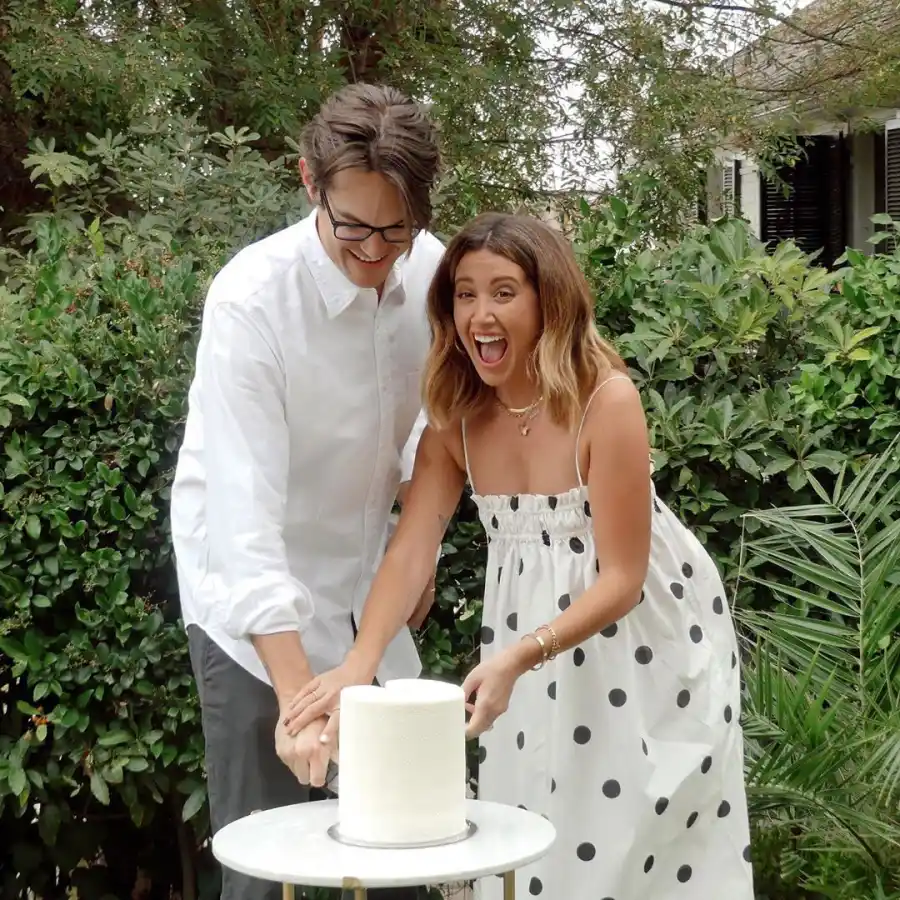 Ashley Tisdale and Christopher French Cake Cutting Sex Reveal Pink White Dress Black Polka Dots