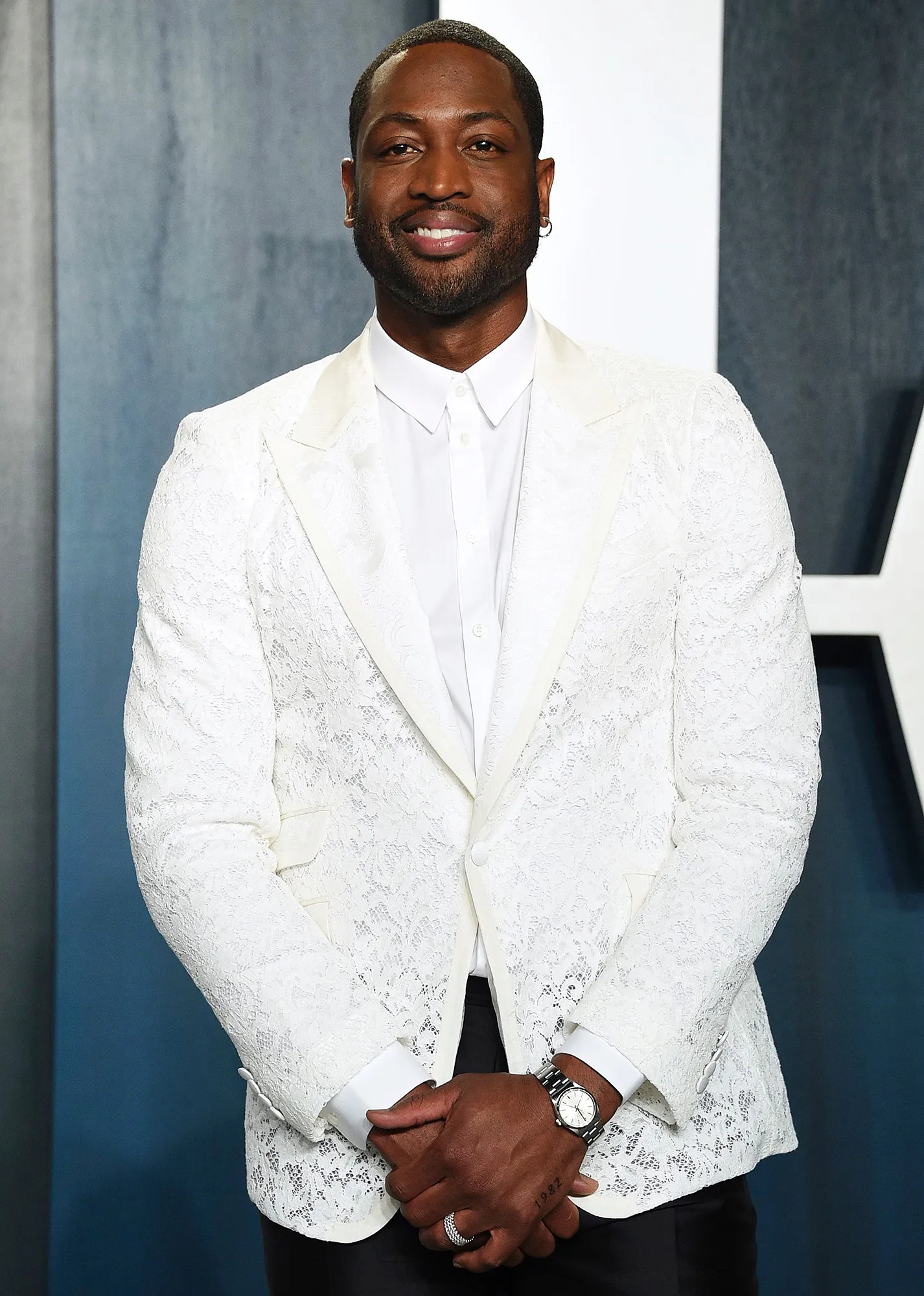 Dwyane Wade Accidently Photobombs Couple's Romantic Beach Proposal