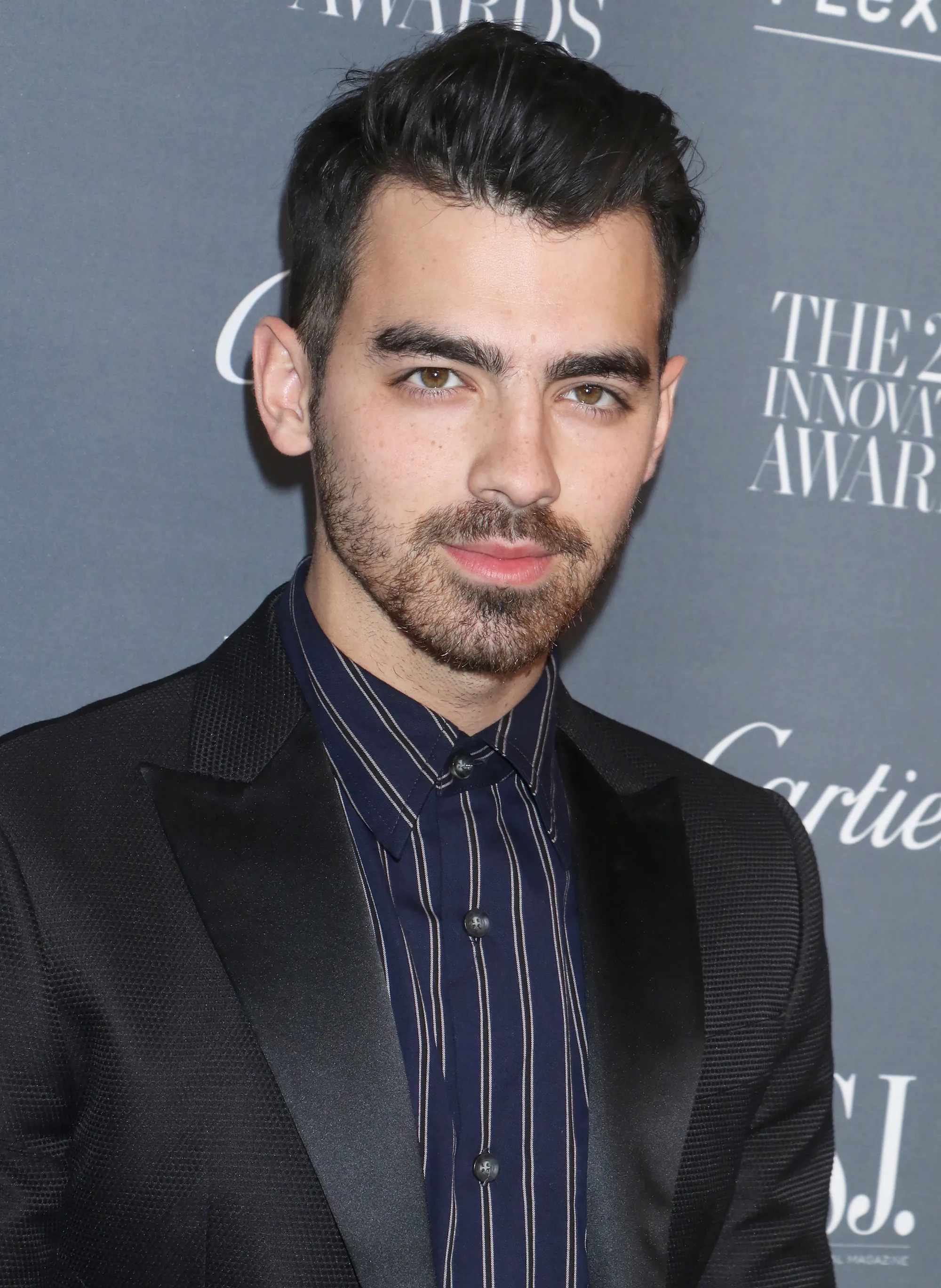 Joe Jonas Showcases Never-Before-Seen Arm Tattoos