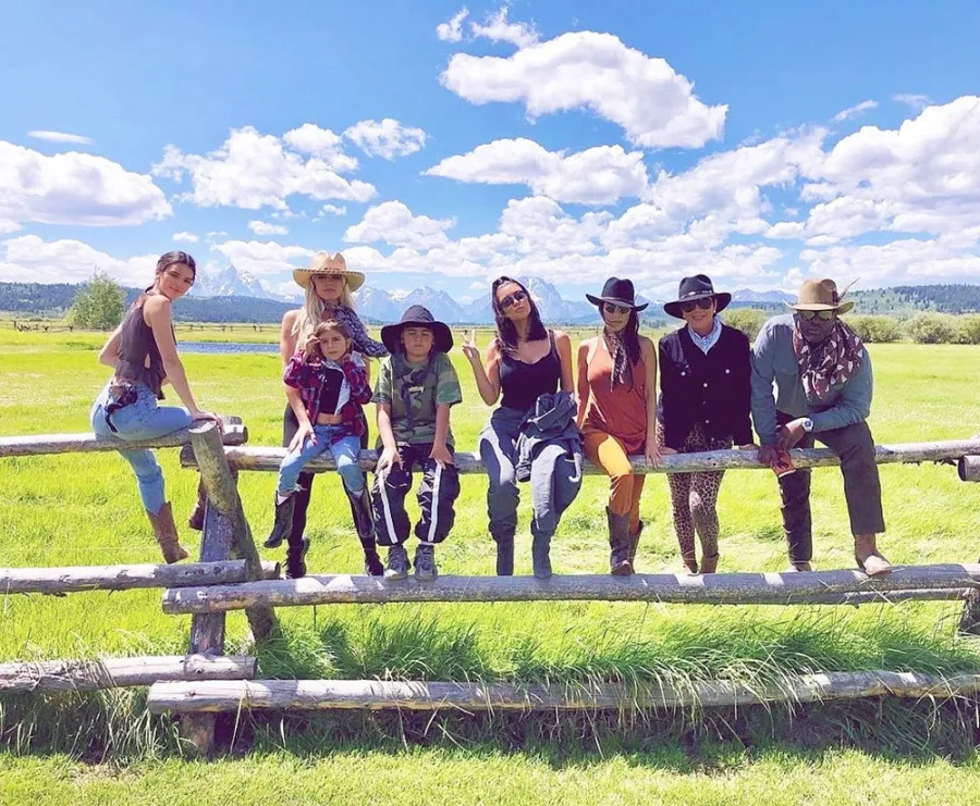 Kardashian Jenner Family Photo Sitting On A Fence