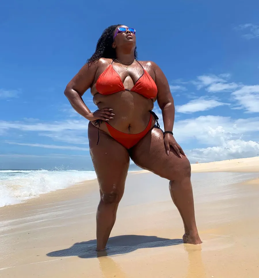 See Lizzo's Hottest Swim Moments