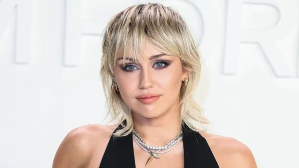 Miley Cyrus Tells ‘All My Exes’ to ‘Eat S--t’ in ‘Prisoner’ Music Video With Dua Lipa