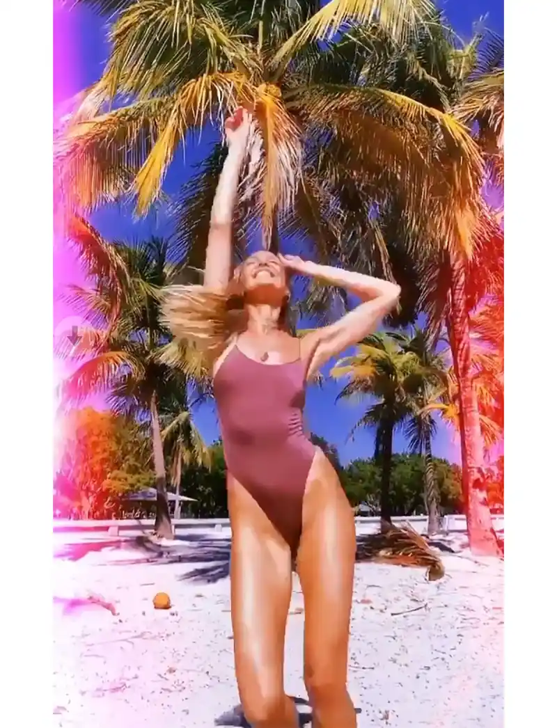 Candice Swanepoel Celebrates the New Year By Dancing in 2 Gorgeous Swimsuits