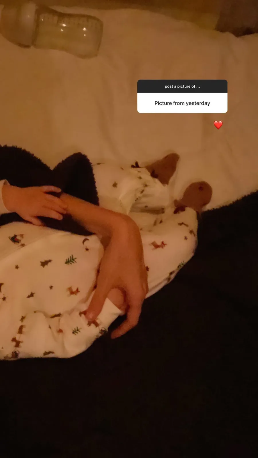 Gigi Hadid Cradles Daughter Christmas Onsie