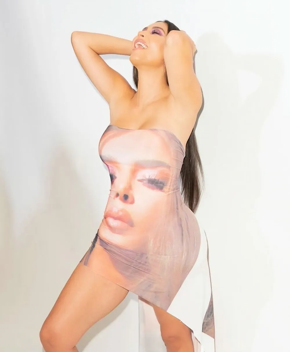 Kim Kardashian Wears a Figure-Hugging Dress With Her Face on It