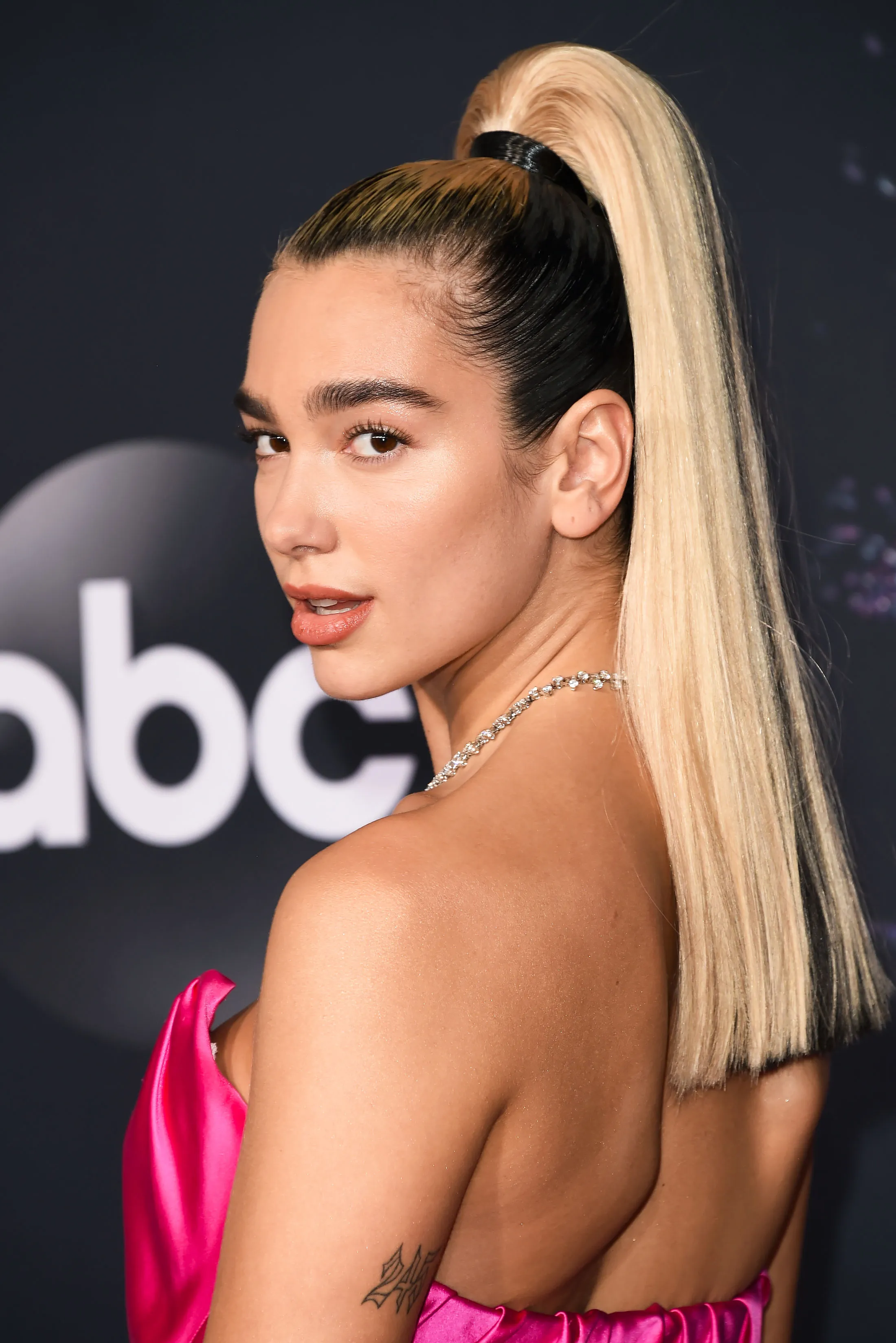 Dua Lipa Looks Unrecognizable in a Short Blonde Wig on U.K. ‘Vogue' Cover