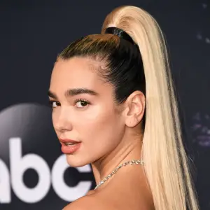 Dua Lipa Looks Unrecognizable in a Short Blonde Wig on U.K. ‘Vogue' Cover