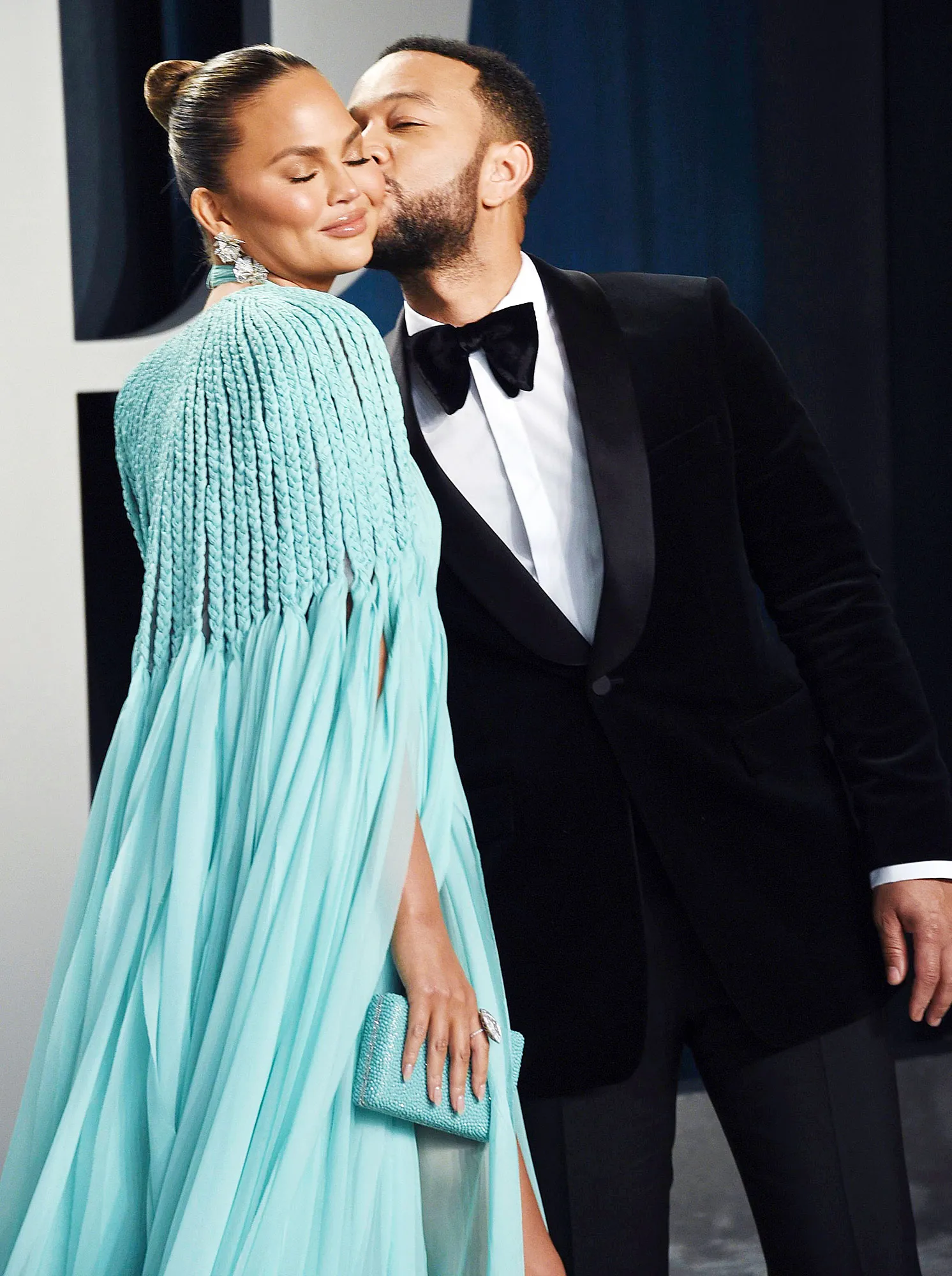 John Legend Kissing Chrissy Teigen on the Cheek