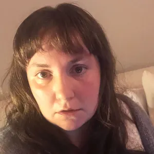 Lena Dunham Is ‘Embracing Uneven Results’ as She Cuts Her Own Bangs