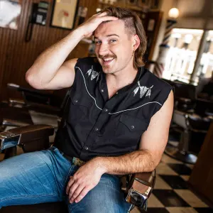 Morgan Wallen poses for a portrait after getting a mullet at Paul Mole Barber Shop Who Is Morgan Wallen 5 Things to Know About the Scandal-Ridden Country Singer