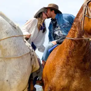 Hannah Brown and Adam Woolard Kissing on Horse Kissing on Horse