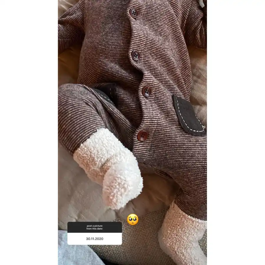 Keeping Cozy Gigi Hadid and Zayn Malik Khai Brown Onesie