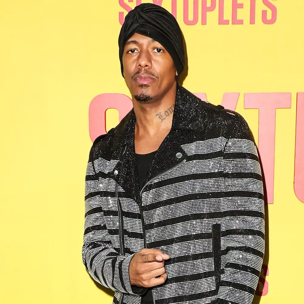 Nick Cannon Tests Positive COVID-19 Steps Back Masked Singer Host