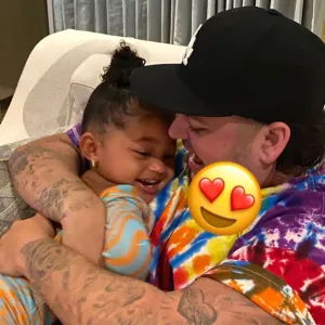 Rob Kardashian Cuddles Niece Stormi in Rare Pics on Her Birthday
