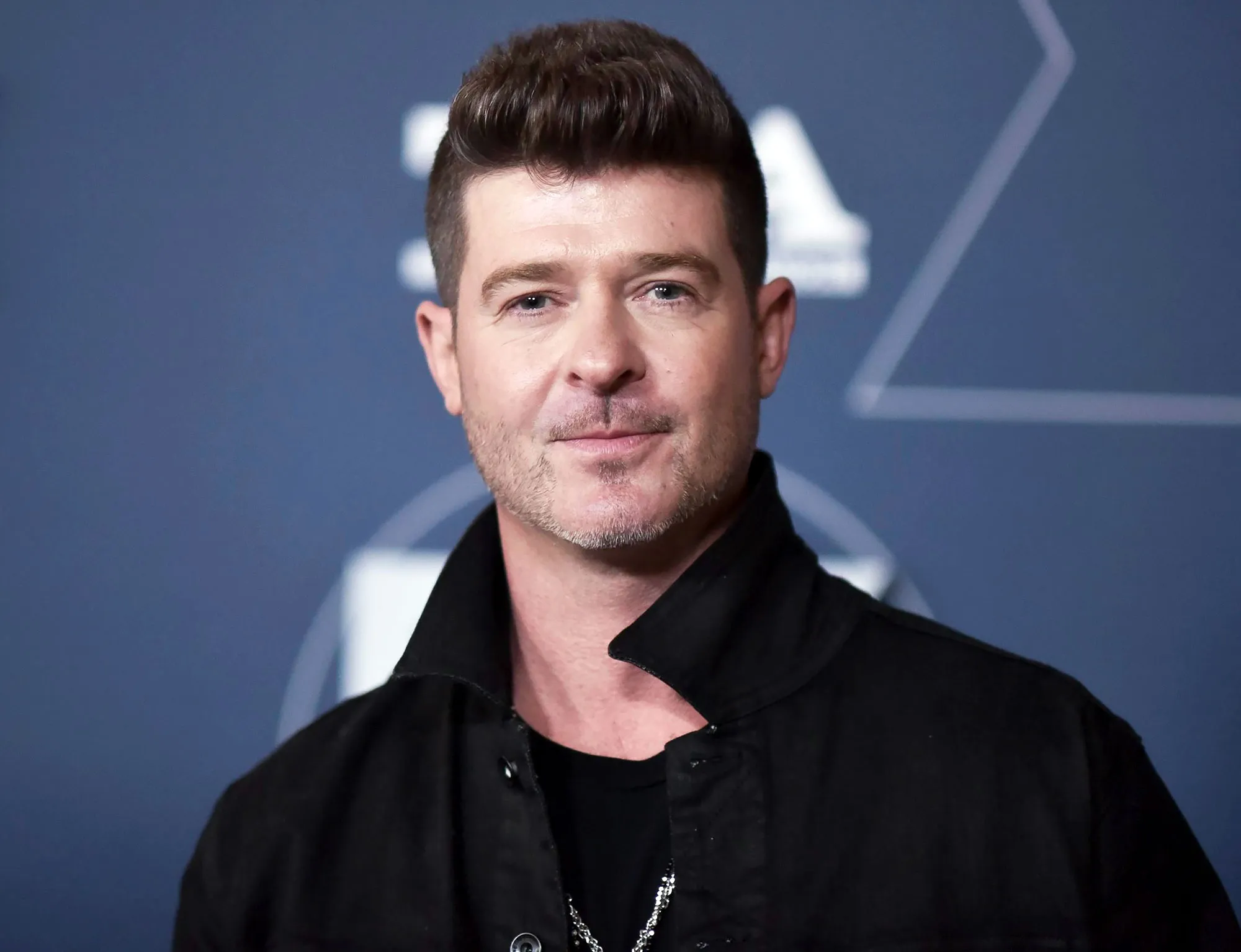 Robin Thicke Says He Is a ‘Total Believer’ in Going to Therapy With Fiancee April Love Geary and Ex-Wife Paula Patton