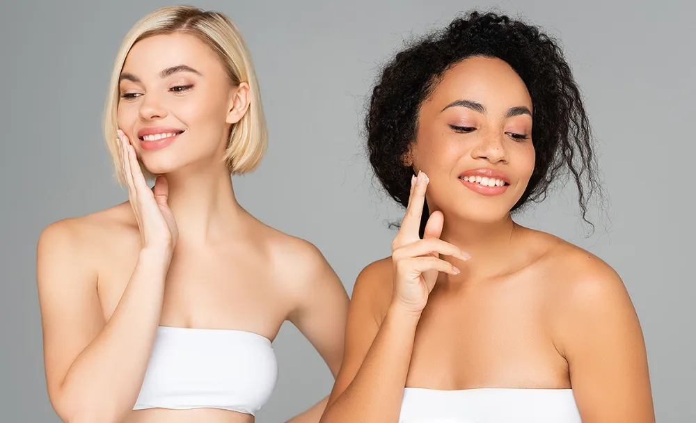 women-applying-face-cream