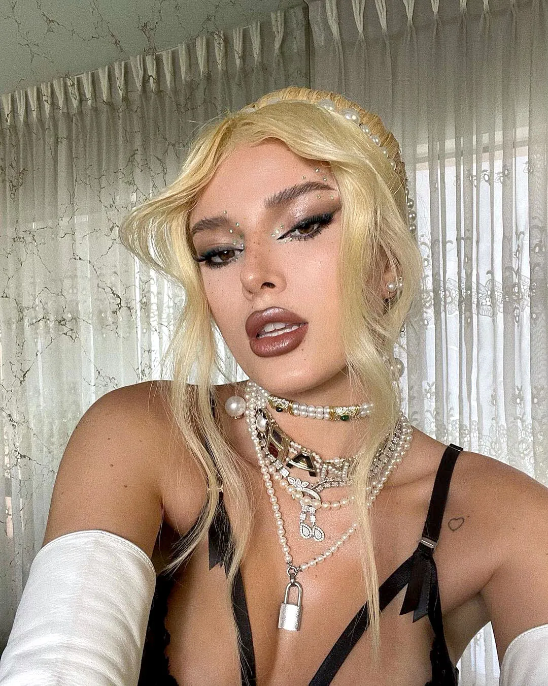 Bella Thorne Reveals What Photo Shoot Gave Her Blistered Eyebrow