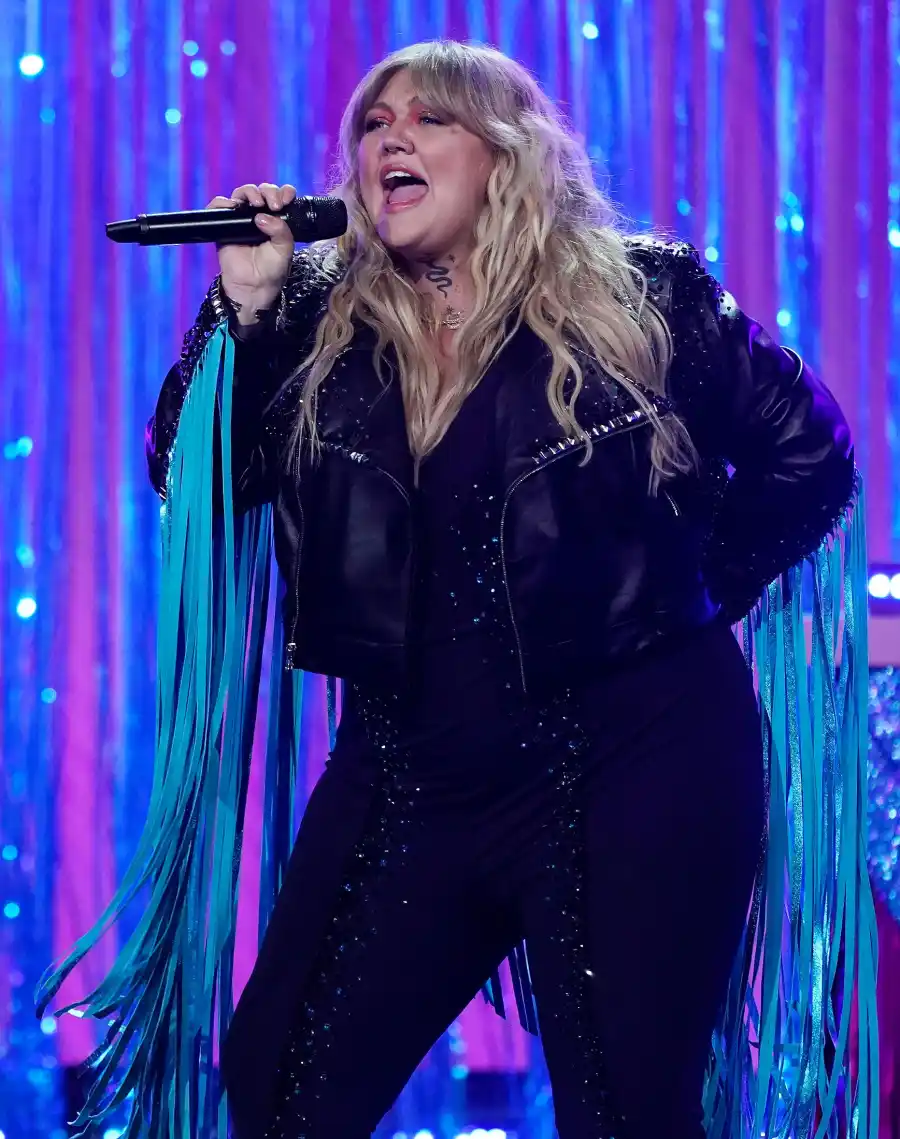 Elle King Debuts Her Baby Bump In Fringed Jacket at ACMs