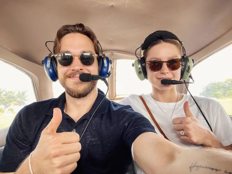 Melissa Benoist and Chris Wood Plane