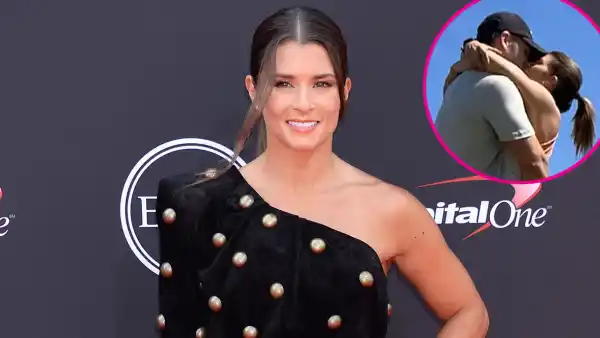 Danica Patrick And Carter Comstock Kiss During Workout