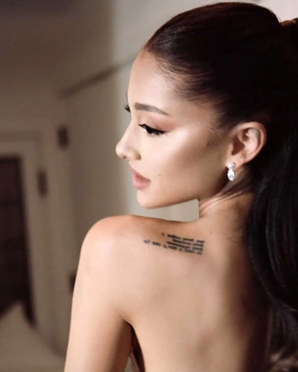 Why Ariana Grande Wore 1 Earring Upside Down at Her Wedding