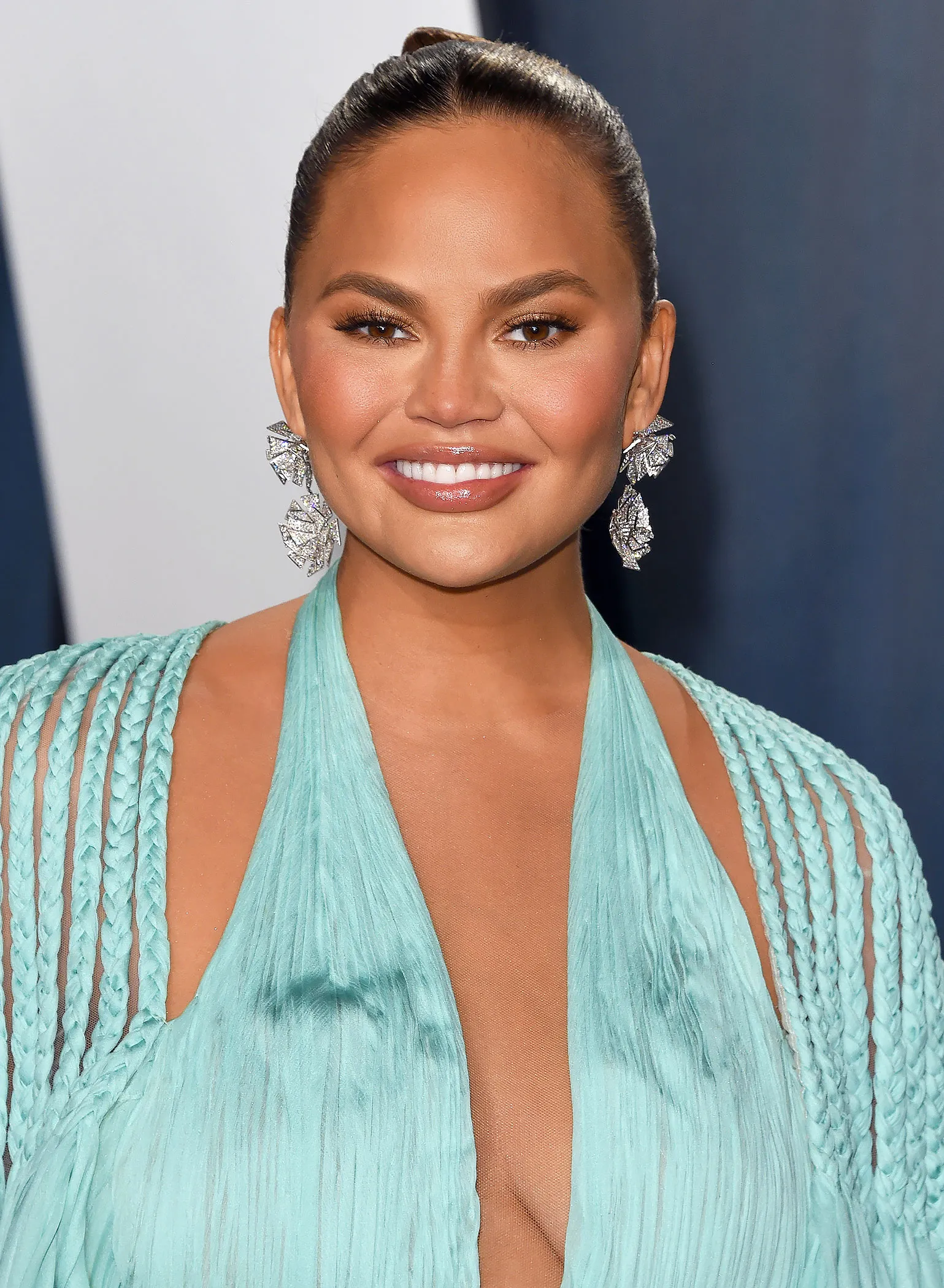 Chrissy Teigen Gets Butterfly Tattoo in Honor of ‘Messes in Progress’