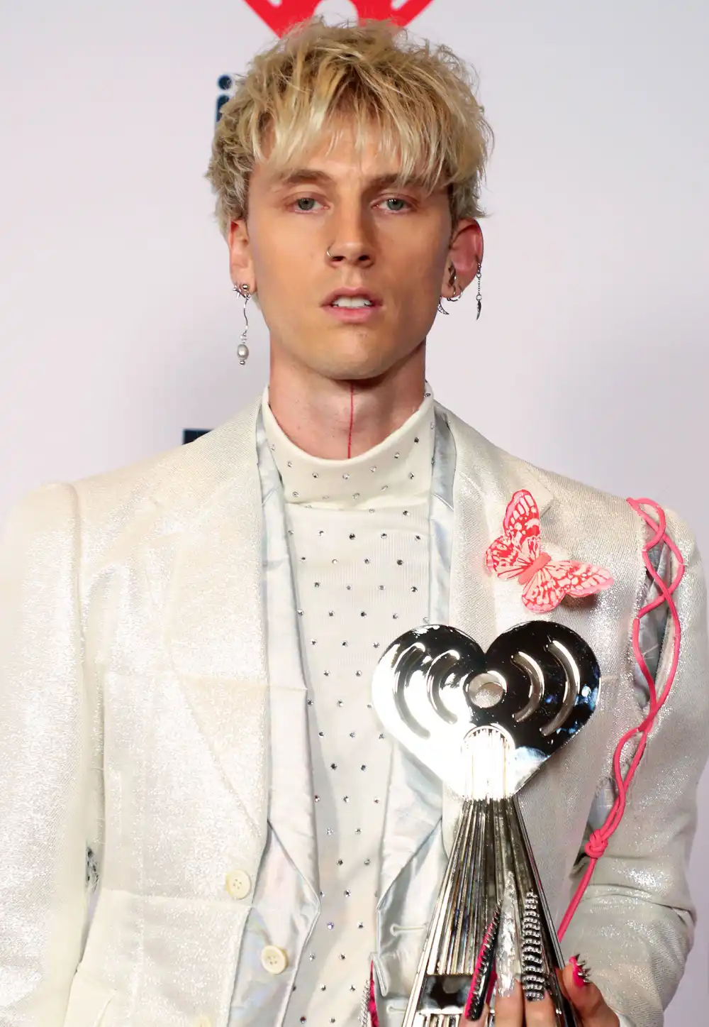 Did Machine Gun Kelly Get Extensions?