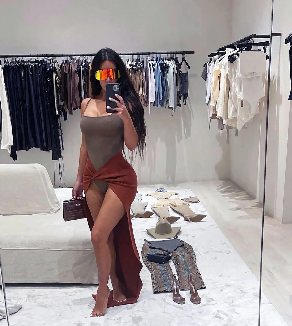 Kim K. Accessorizes Skin-Tight Bodysuit With Massive Orange Sunglasses: Pic