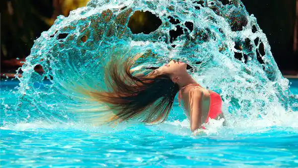 Woman-In-Pool-Stock-Photo