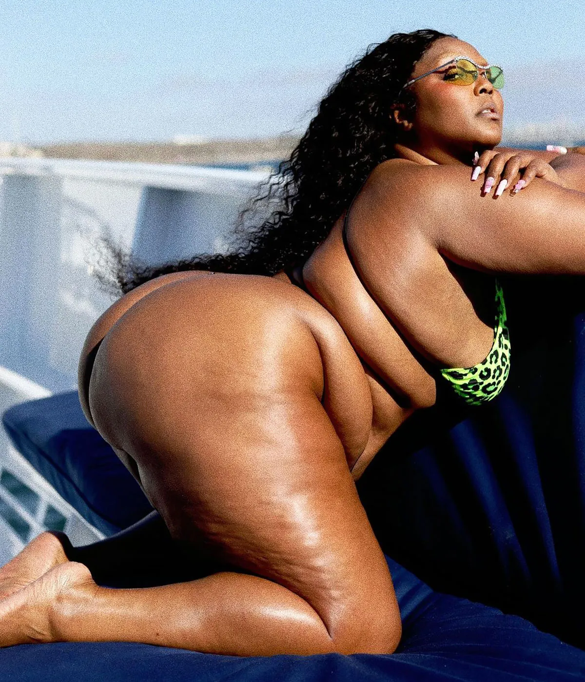 Lizzo Epitomizes Hot Girl Summer in Neon Green Cheetah-Print Bikini