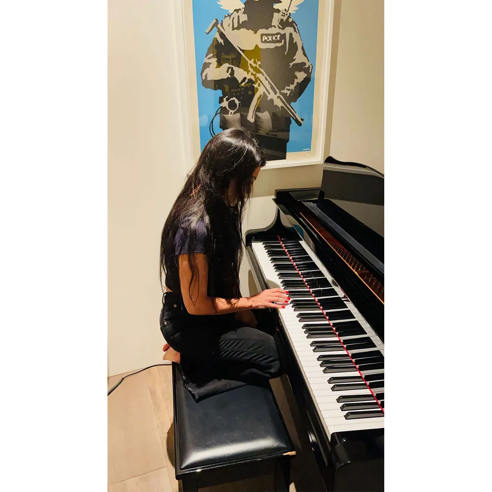Travis Barker&rsquo;s Daughter Alabama Shares Video of Dad, Kourtney Playing Piano
